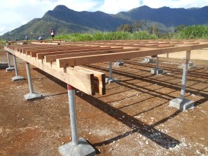 Prefab bearers and joists assembled on posts on site